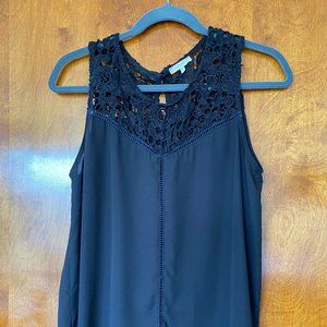 Elegant black sleeveless blouse